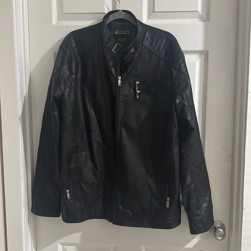 Black leather jacket 
Refinery Republic Black Faux Leather Full Zip Jacket Sz L